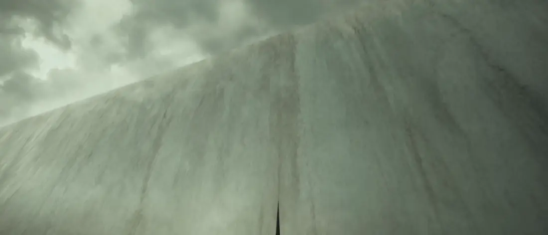 The wall fills the sky